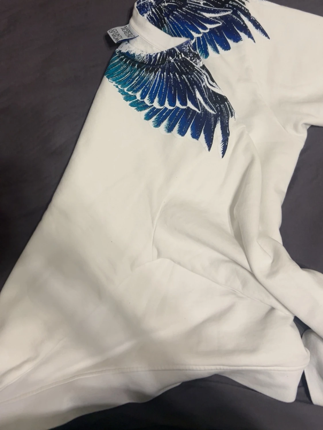 Vit sweatshirt med blått vingtryck - 2
