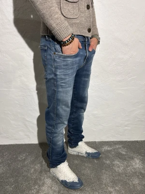 Replay jeans  - Ett par snygga jeans från Replay i storlek W29 L34 i modellen anbbas hyperflex 