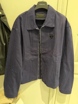Praoda navy blue jacket - Size M, fits 100% true to size. Just like new, never worn. Feel free to ask questions. Yes we ship to sweden and other countries too.