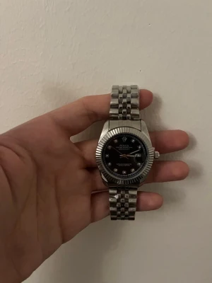 Rolle klocka  - Helt ny och oandvänd Rolle klocka.