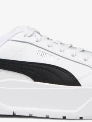 Vita och svarta Puma sneakers - Snygga vita sneakers från Puma med klassisk svart formstripe på sidan. Skorna har en låg silhuett, vita snören och en tjock vit sula. Tillverkade i slätt lädermaterial för en clean och modern look. Storlek 37 använda av mig en gång. Jätte sköna 