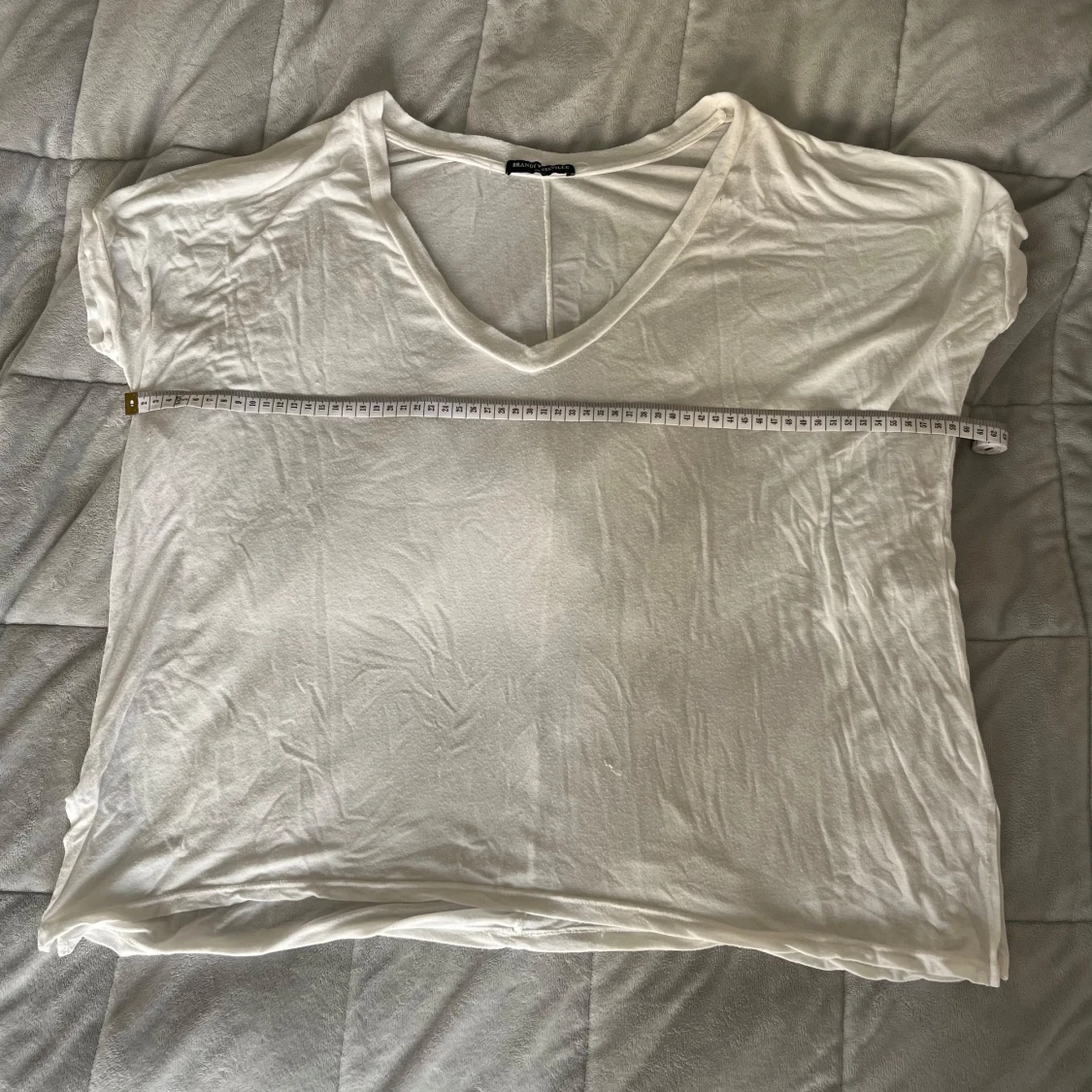 Vit oversized v-neck Brandy Melville - 90