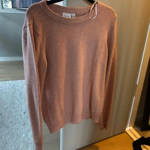 Rosa stickad vila tröja  - Super fin använd Max 3 gånger  