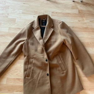 Kappa  - Fin kappa aldrig andvänd i storlek L.