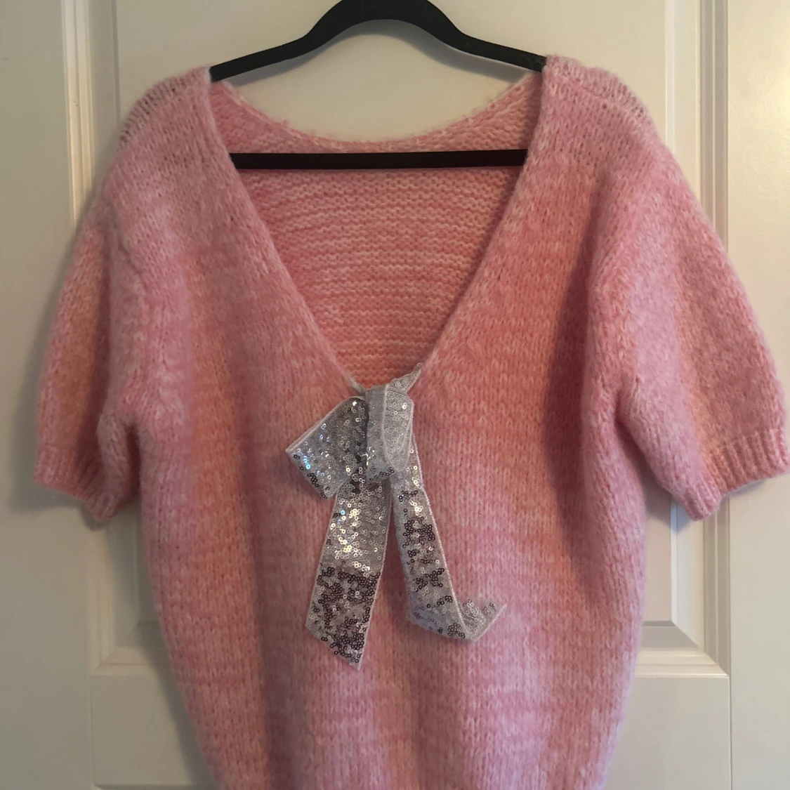 Rosa stickad rosett tröja  - 90