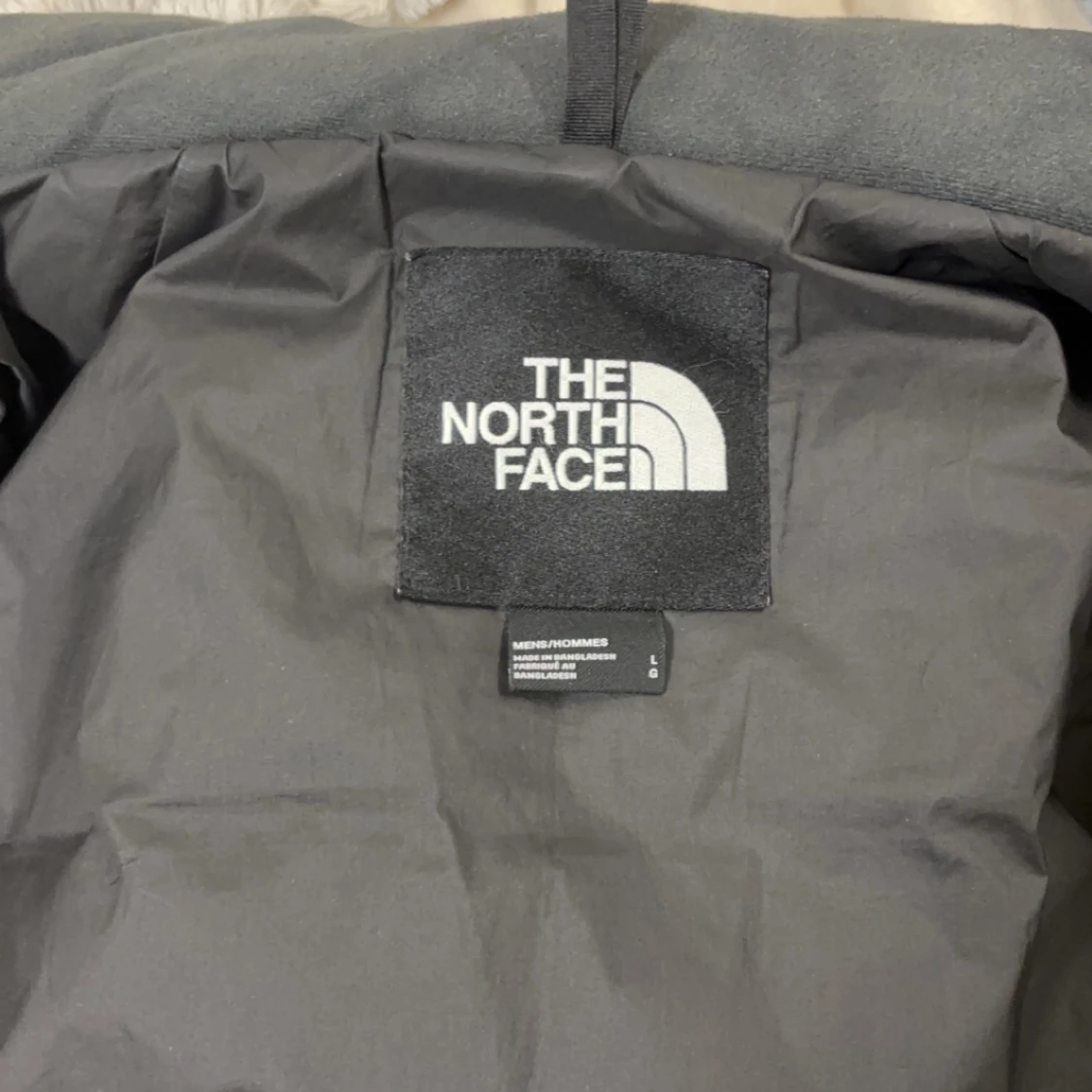Svart dunväst från The North Face storlek L - 2