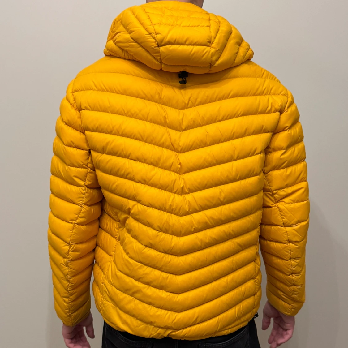 Gul dunjacka från Peak Performance - 91