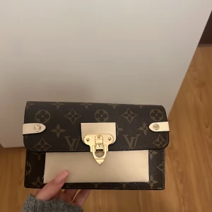 Brun begie väska - Aldrig använd.