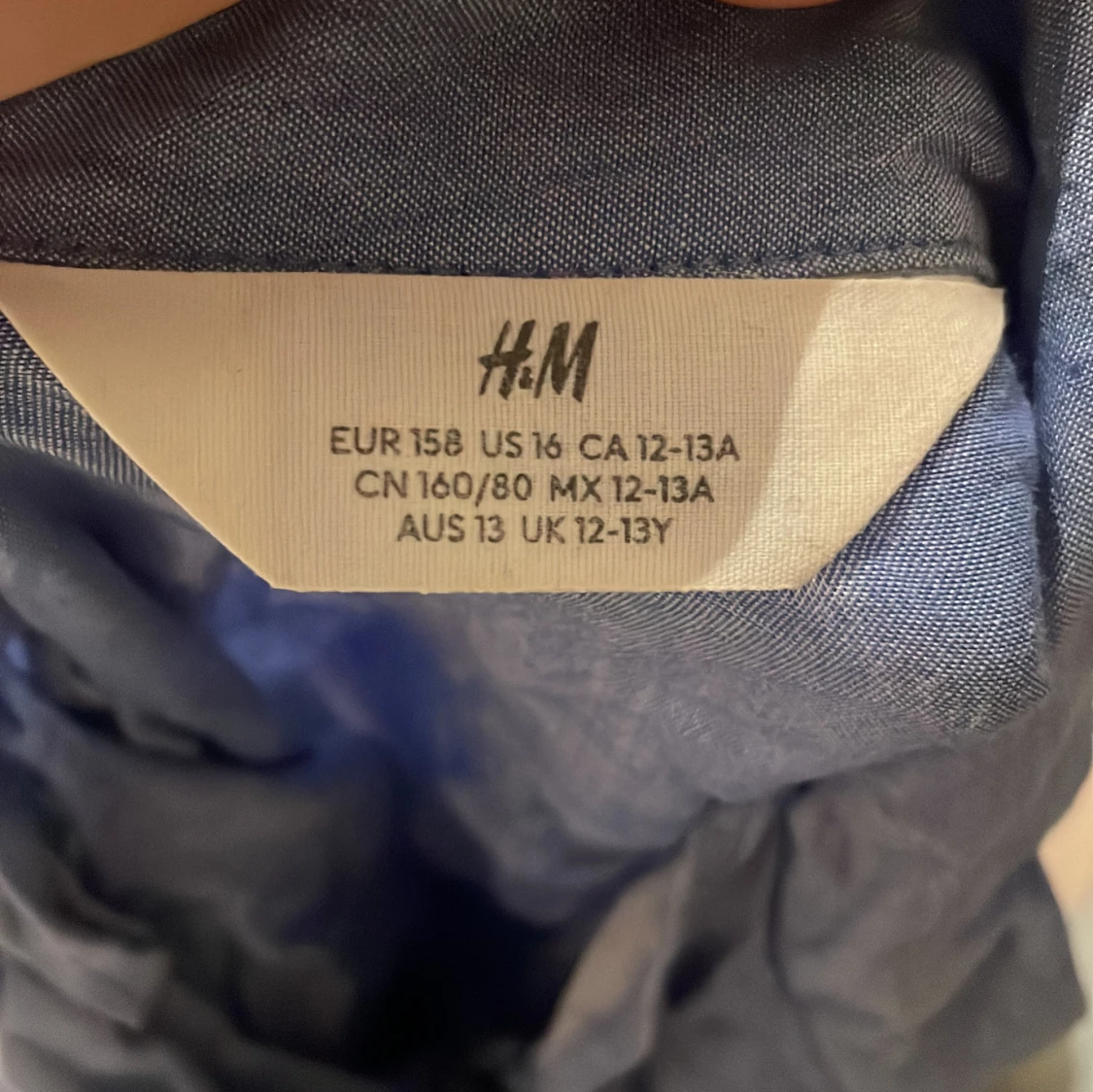 Blå knytblus från H&M - 91