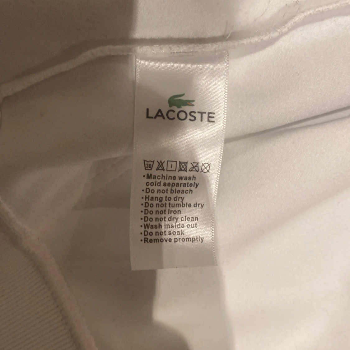 Vit hoodie från Lacoste - 92