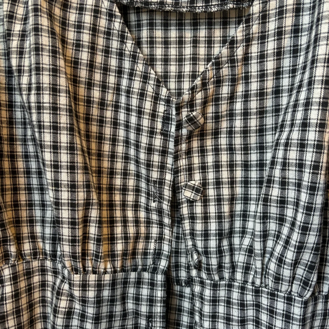 Peplumblus i rutigt tyg - 90