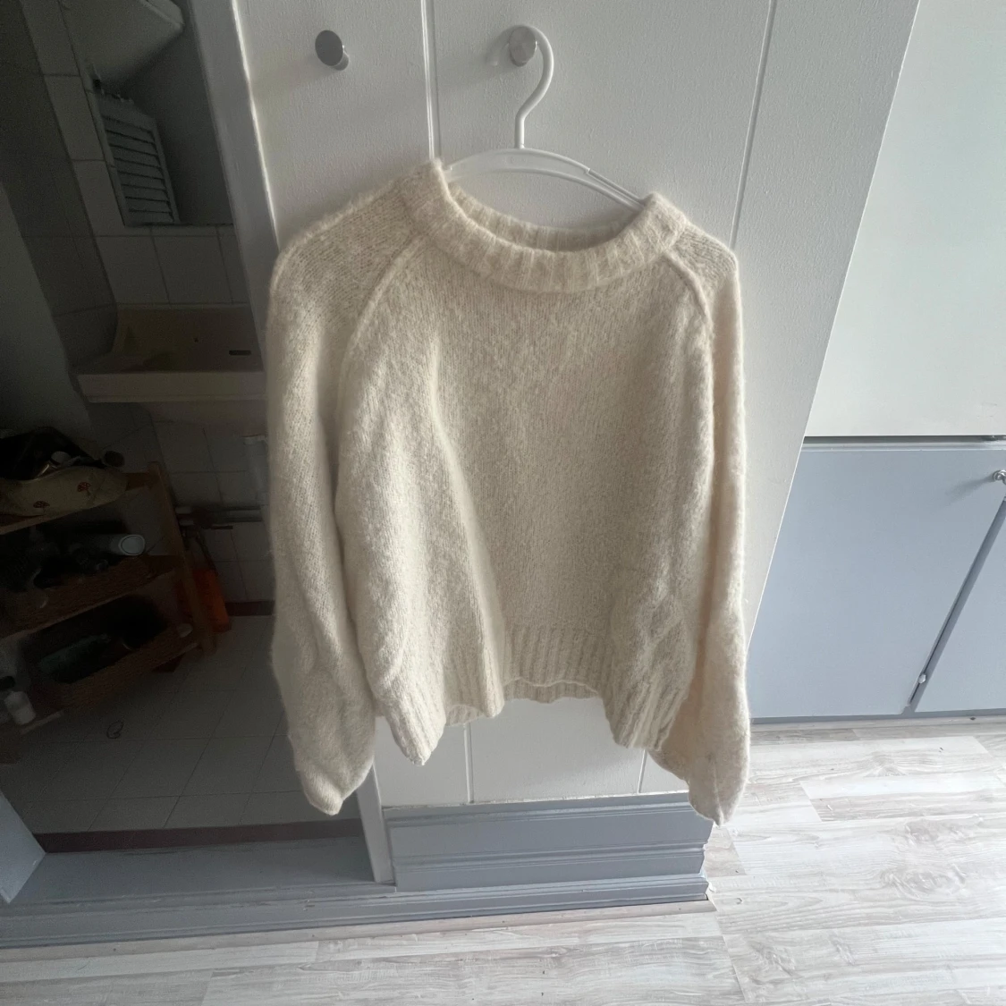 Fin vit stickad tröja