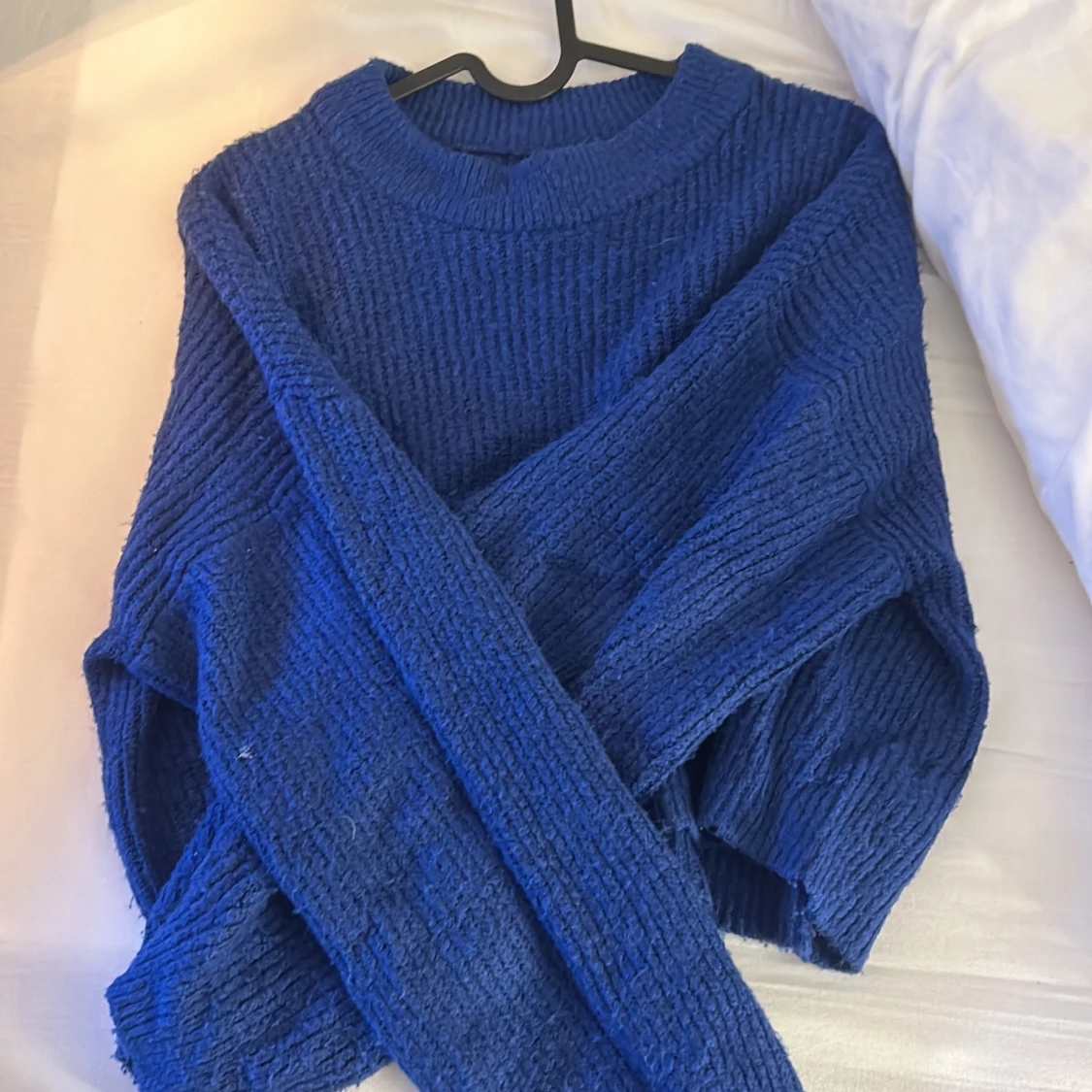 Blå stickad tröja