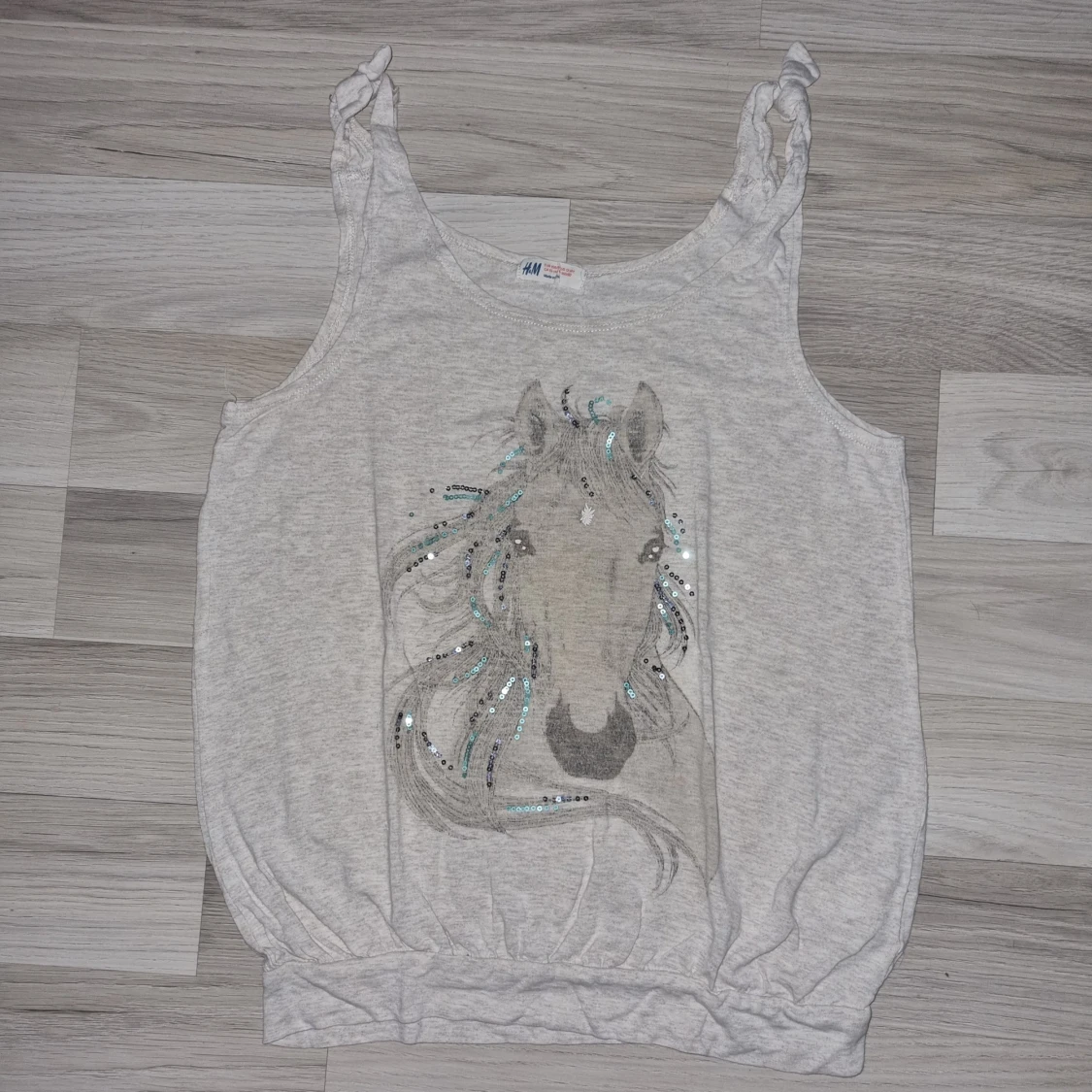 Ljusbeige linne med hästmotiv från H&M