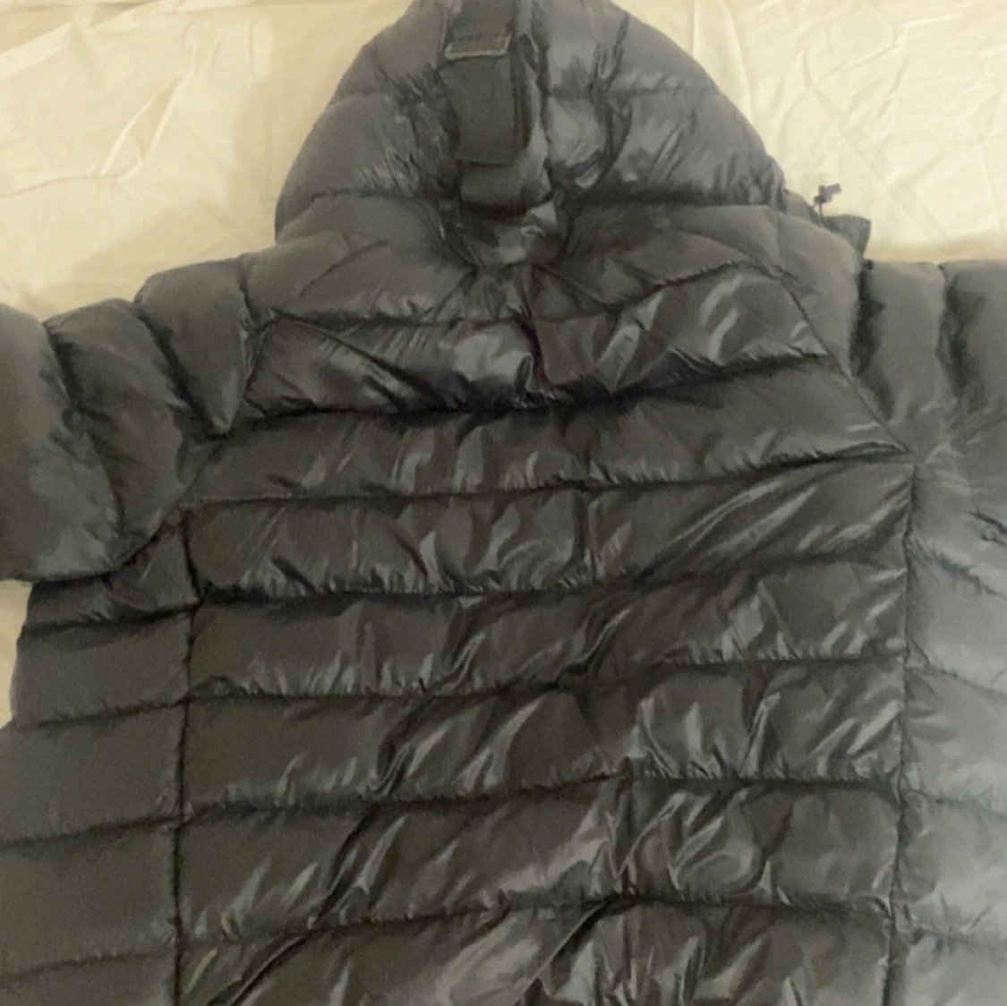 Svart dunjacka från Peak Performance - 91