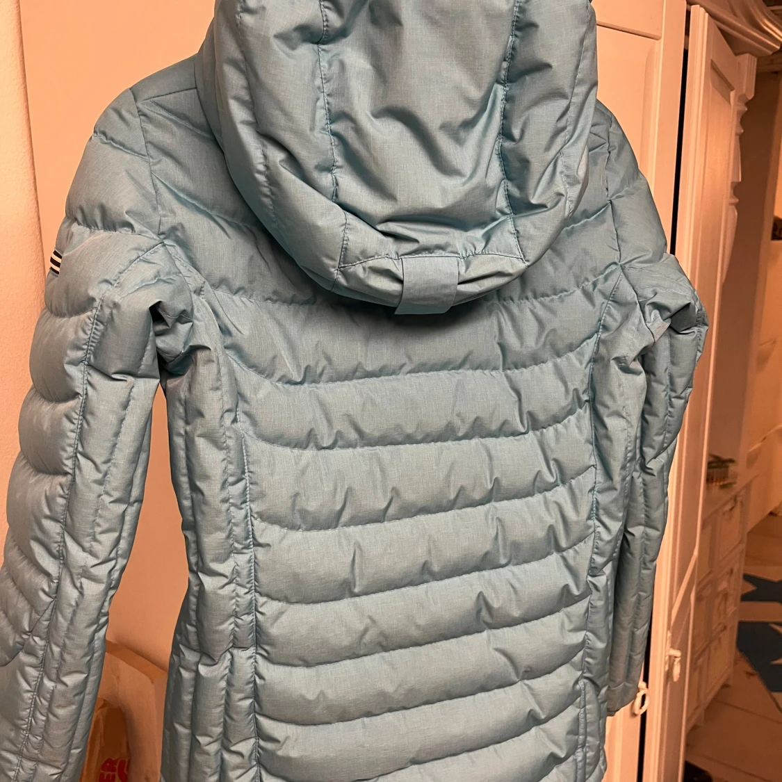 Ljusblå dunjacka från Peak Performance - 92