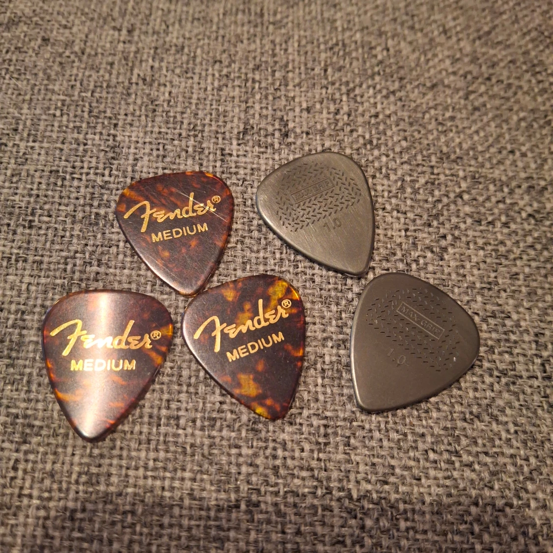 4 guitar picks sold 10kr each