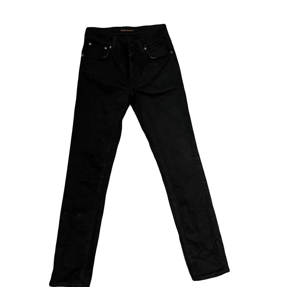 Stilrena svarta nudie jeans. Modell thin finn. Storlek 30/32. . Jeans & Byxor.