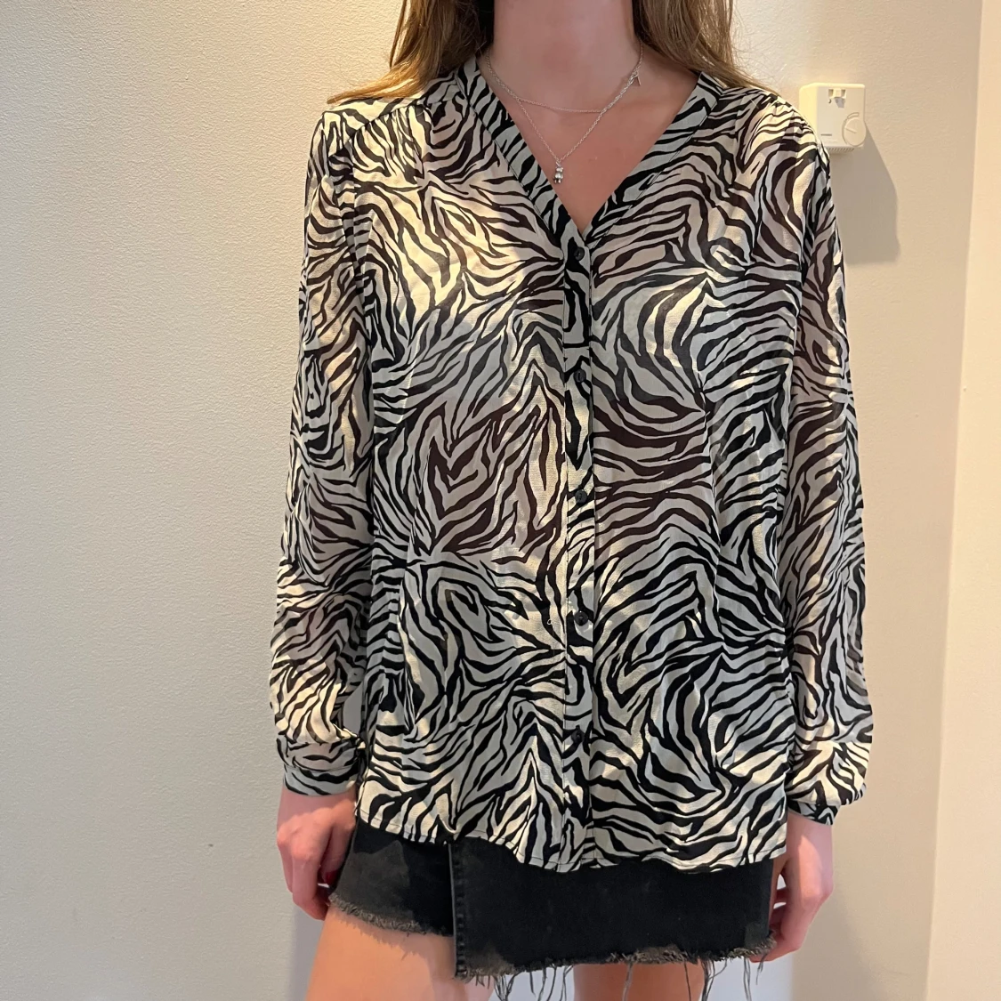 Blus i zebramönster