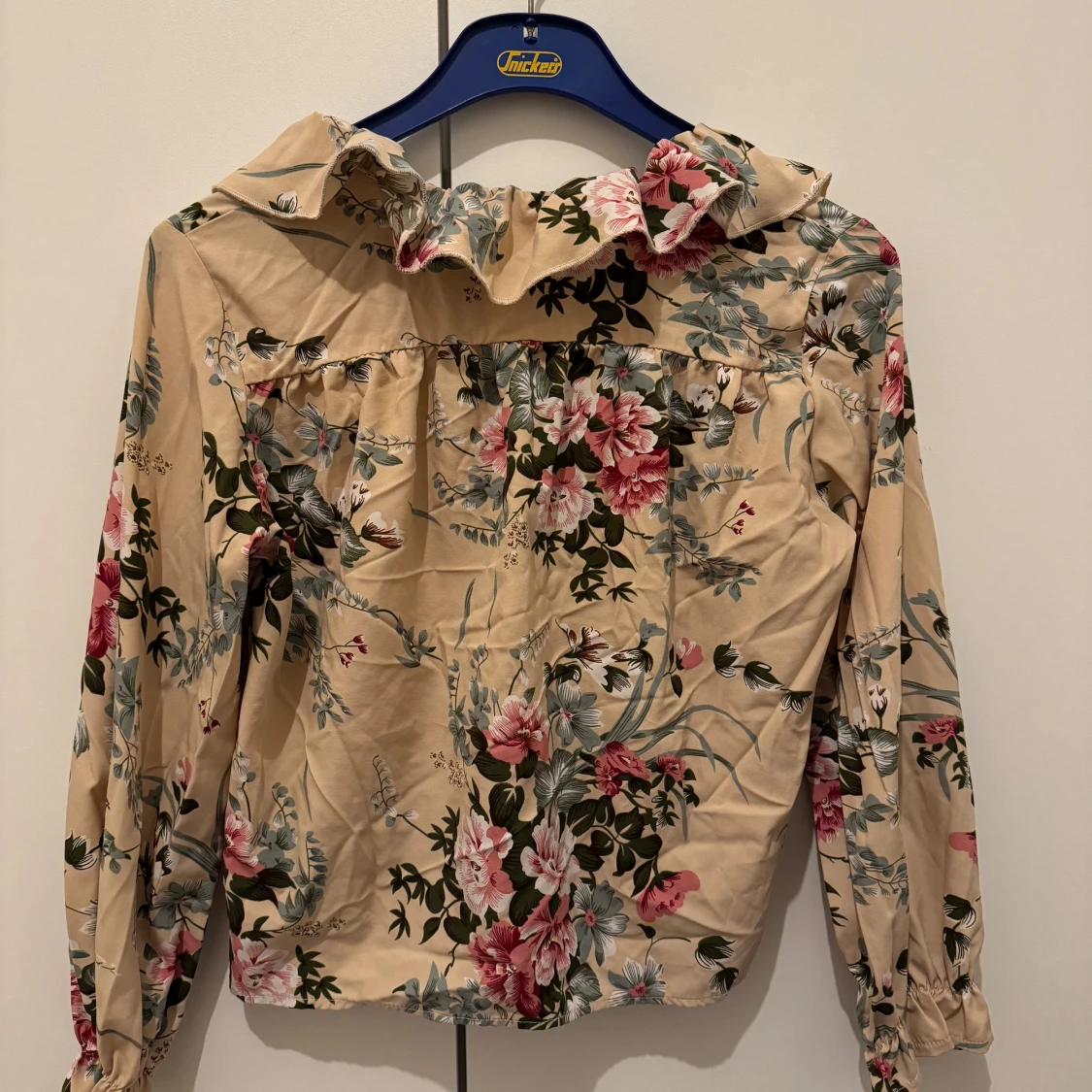 Blommig beige tröja  - 90