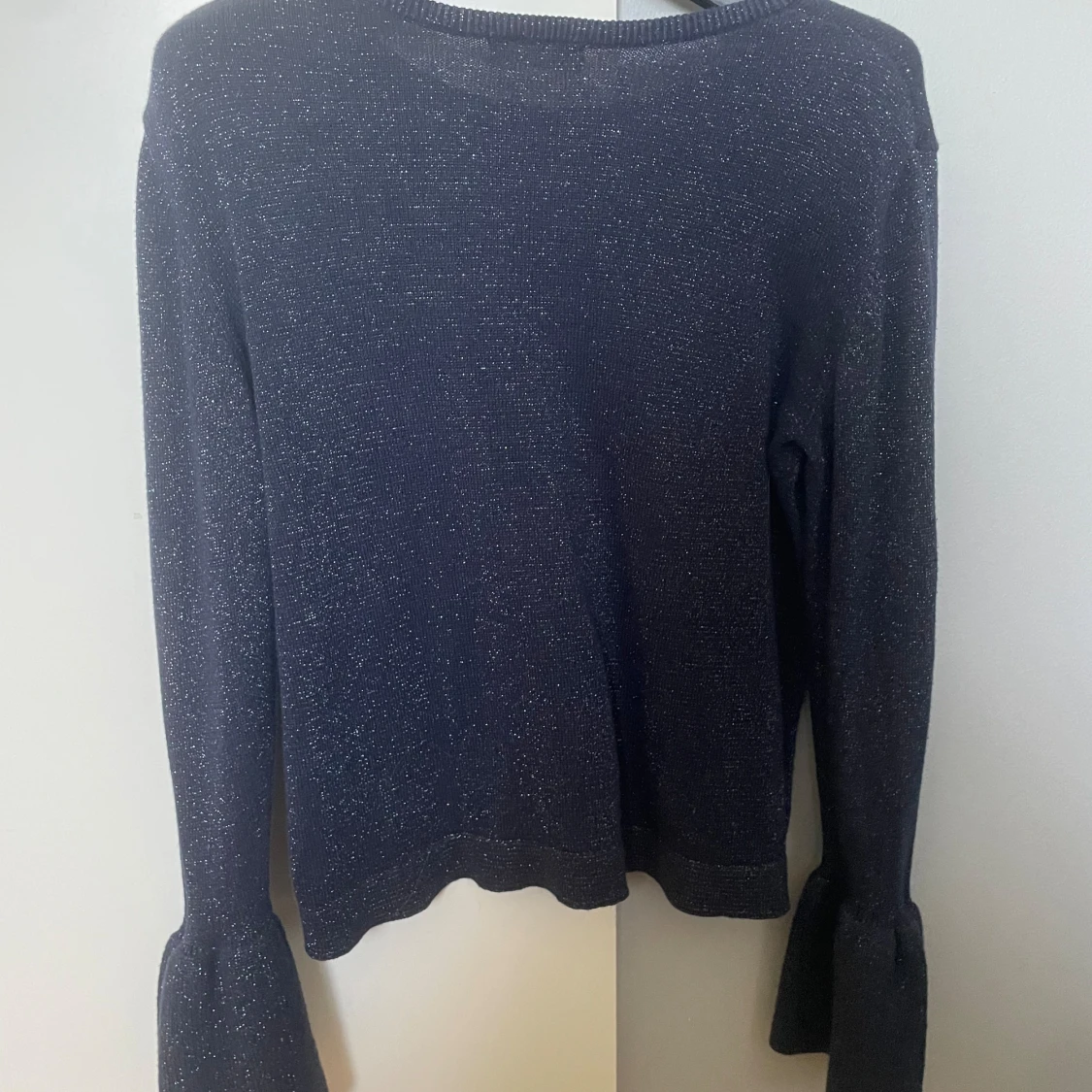 Glittrig långärmad blus - 91