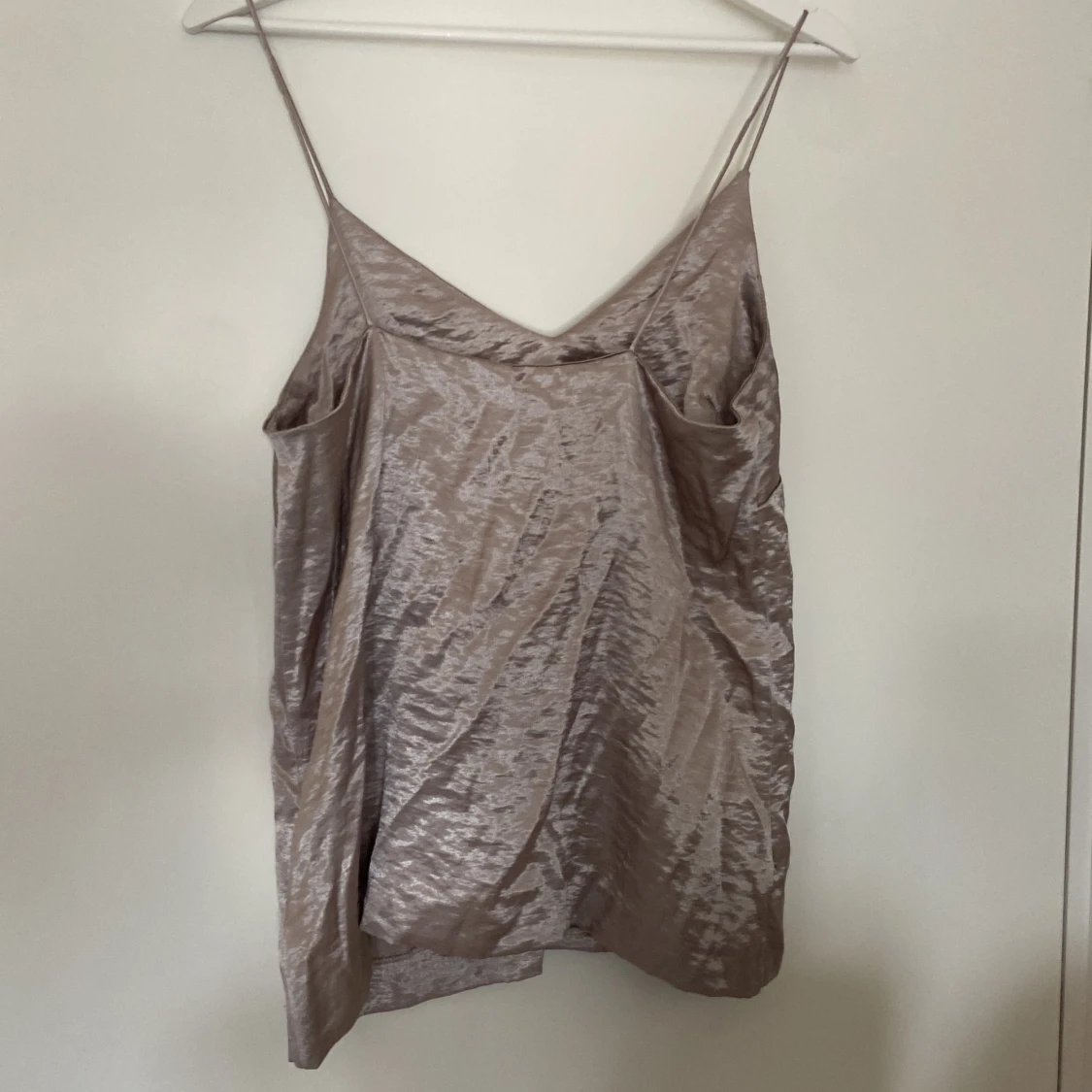 Beige glansig linnetopp från H&M - 90