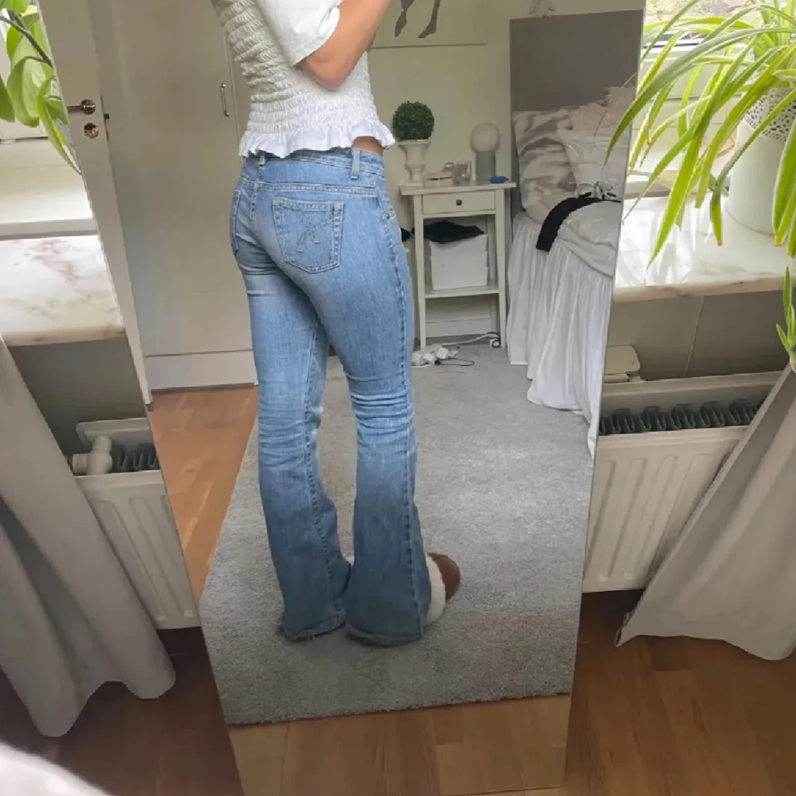 Ljusblå lågmidjade bootcut jeans - 90