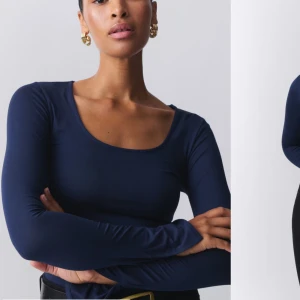 Mörkblå långärmad topp - Snygg mörkblå långärmad topp med rund halsringning. Perfekt för en stilren look och kan enkelt matchas med olika outfits. Toppen har en tight passform som framhäver figuren.