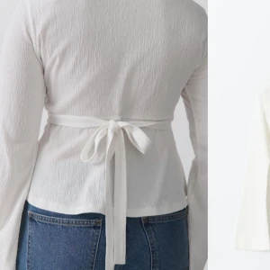 Vit tröja från Gina💕.  - Säljer denna fina tröjan med band som man knyter i ryggen💕den är i nyskick och använd en gång💕