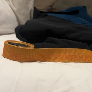 Orange bälte peak performance - Säljer ett coolt orange bälte märke peak performance 