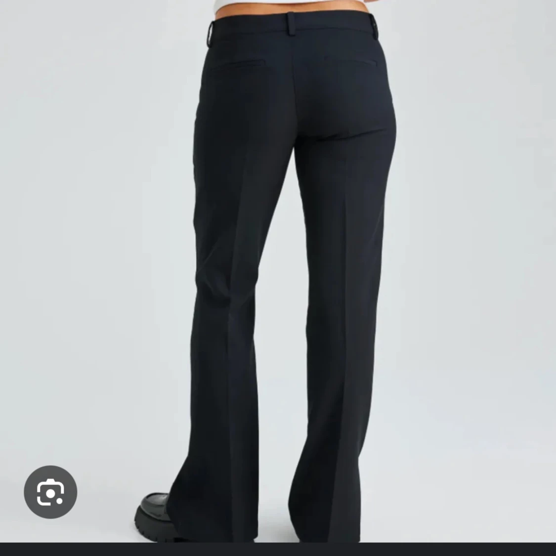 Svarta kostymbyxor