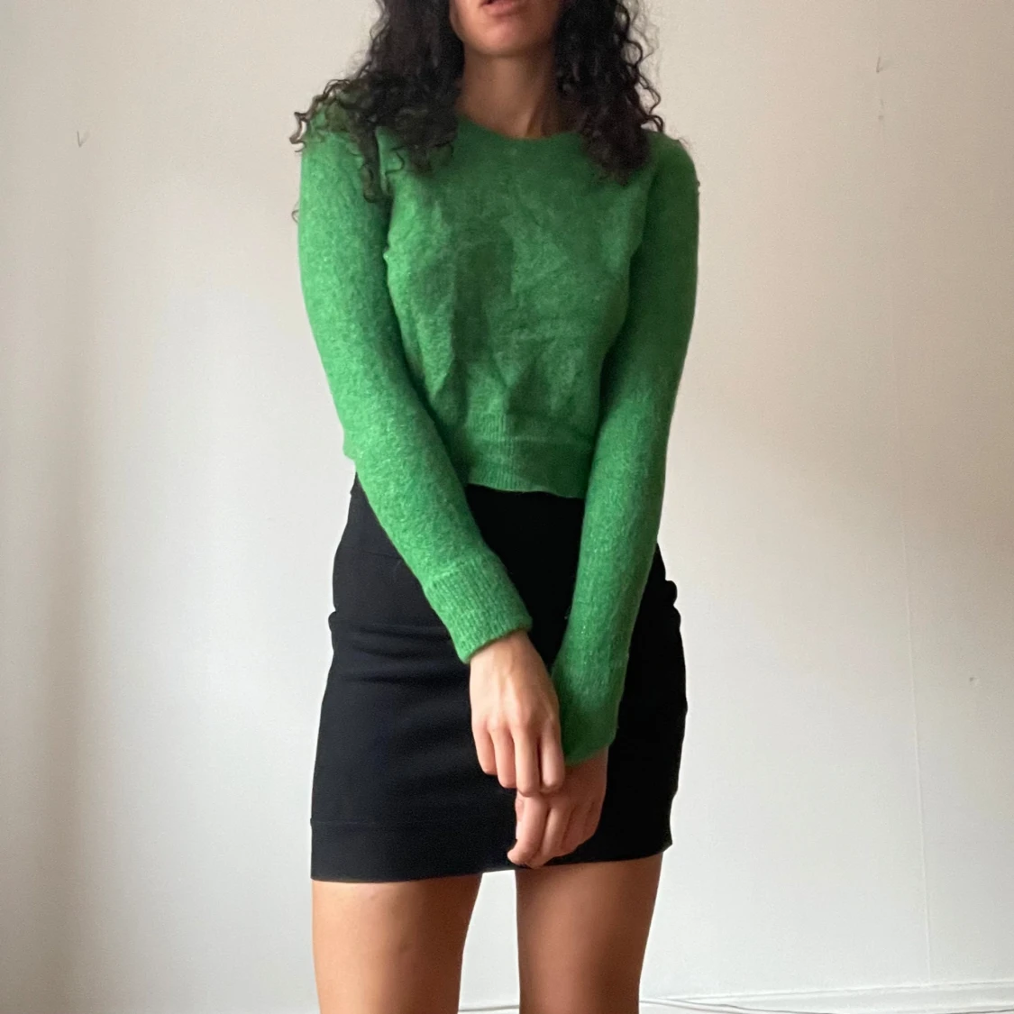 Stickad glittrig grön tröja