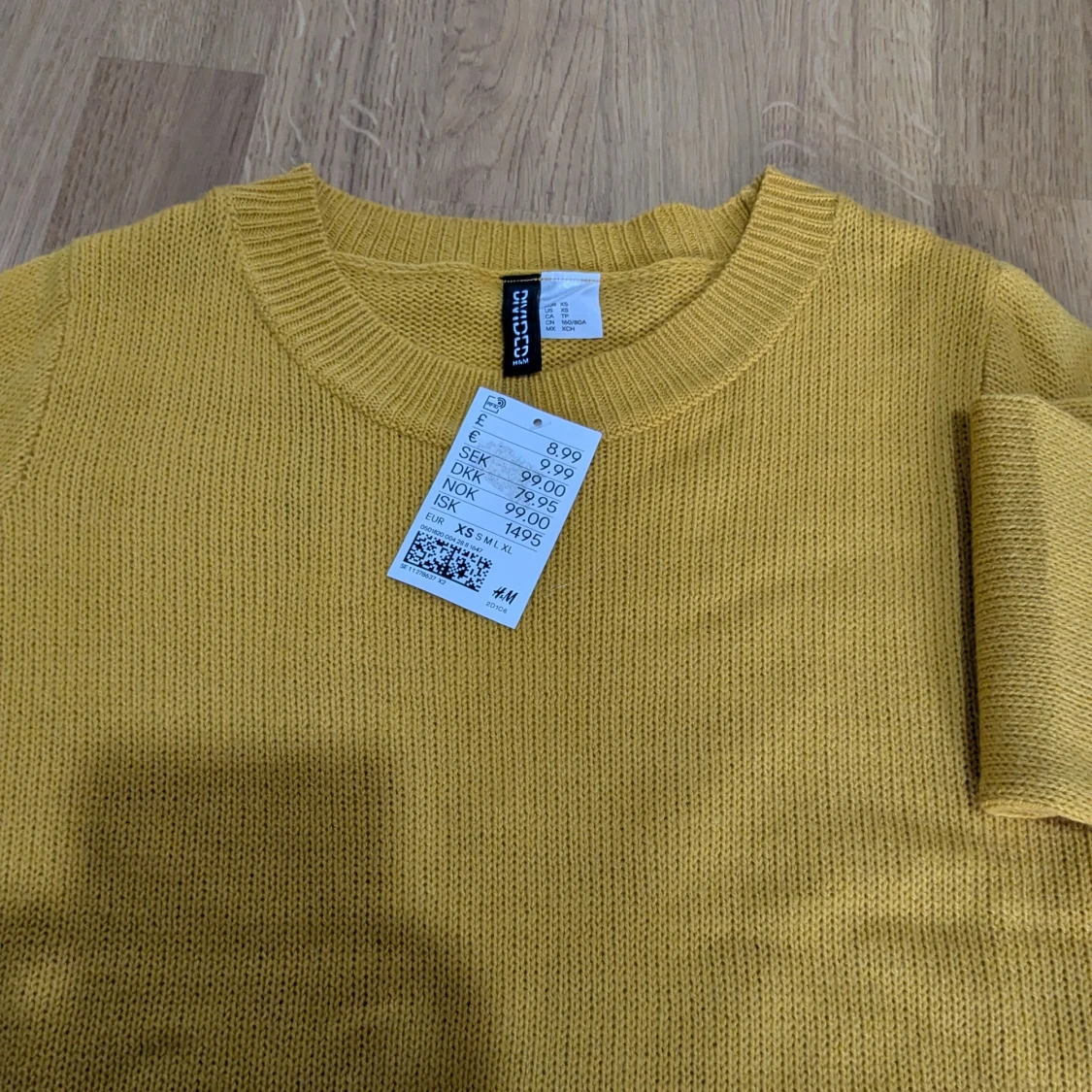 Oanvänd stickad tröja  - 90