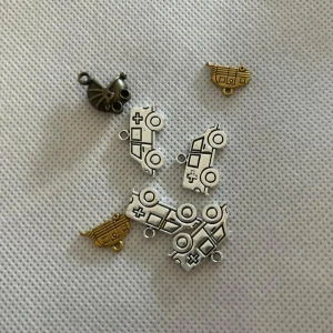 Berlocker  - Berlocker  Frakt tillkommer 