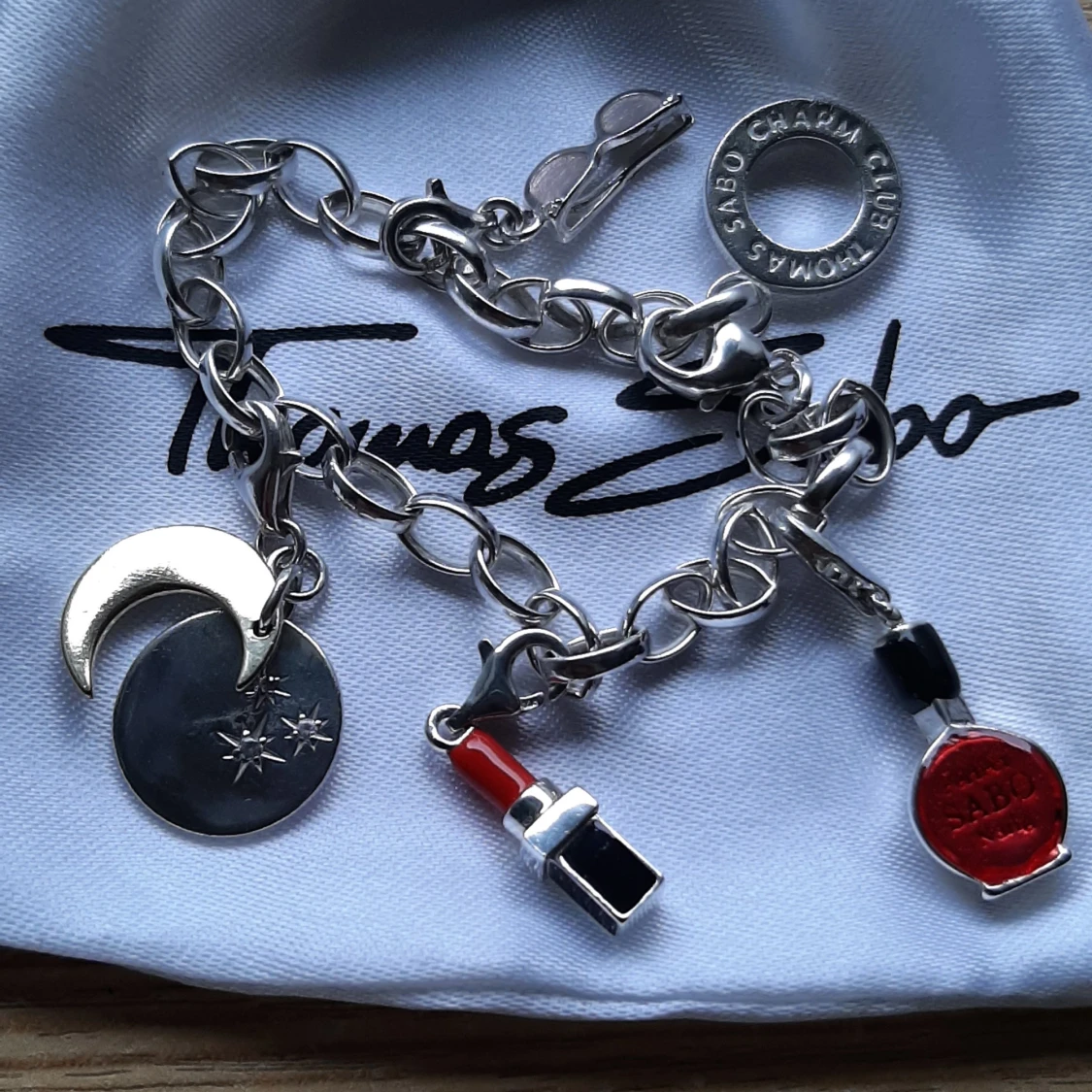 THOMAS SABO ARMBAND M BERLOCKER.  - 91