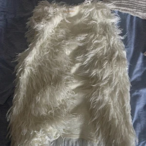 Pälsväst - Päls väst från vet inte märket men den är stl S/M använd några fåtal gånger