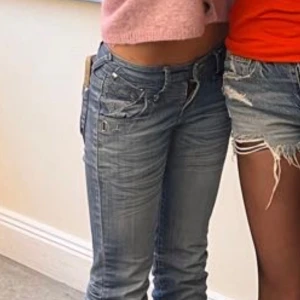 Lågmidjade jeans - As snygga lågmidjade jeans, säljer för att de är för korta för mig