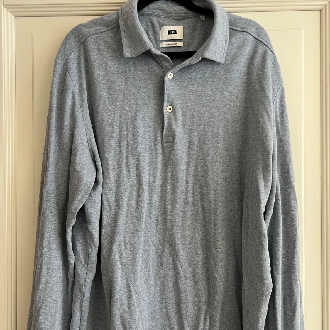 Grå pikétröja från WE