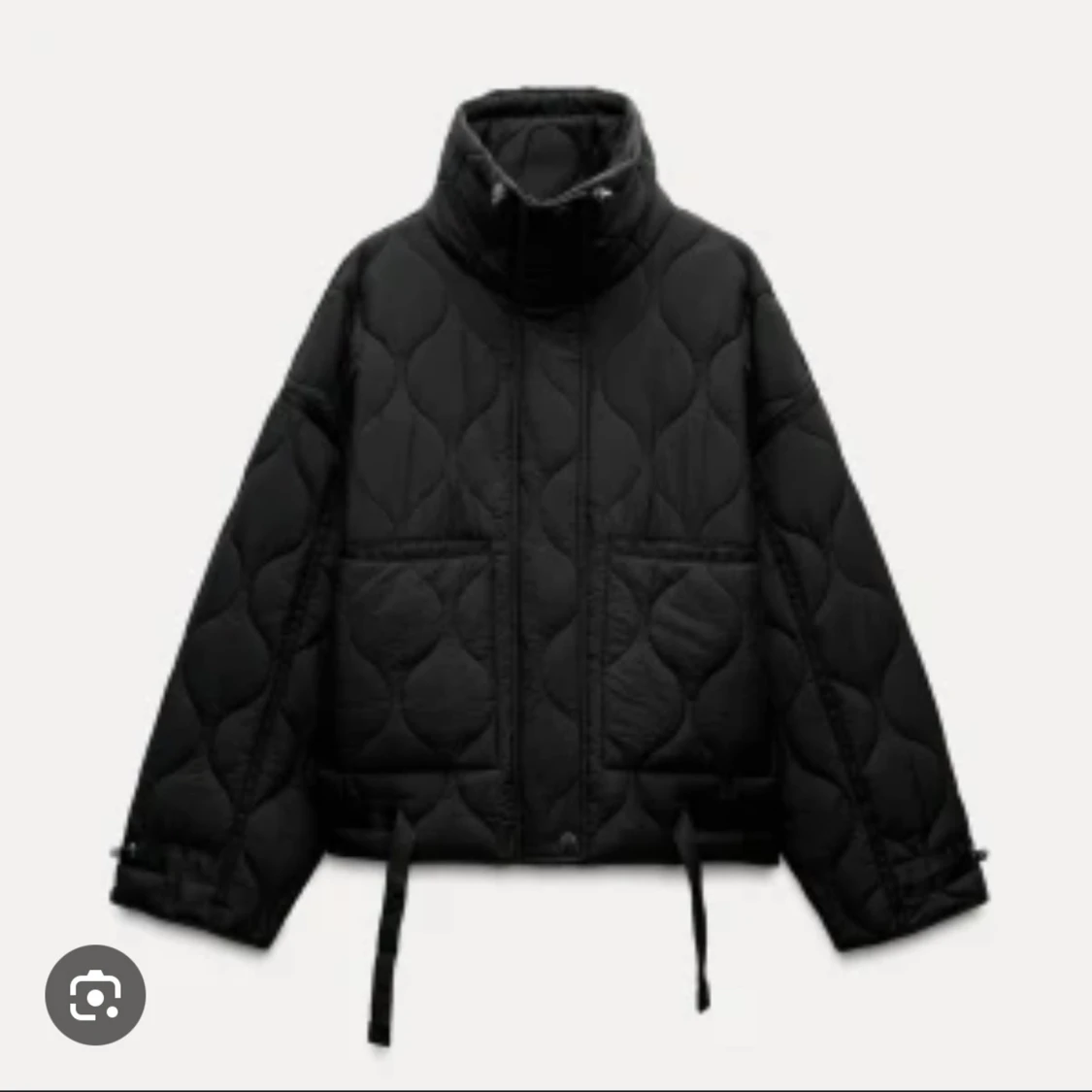 Svart quiltad pufferjacka