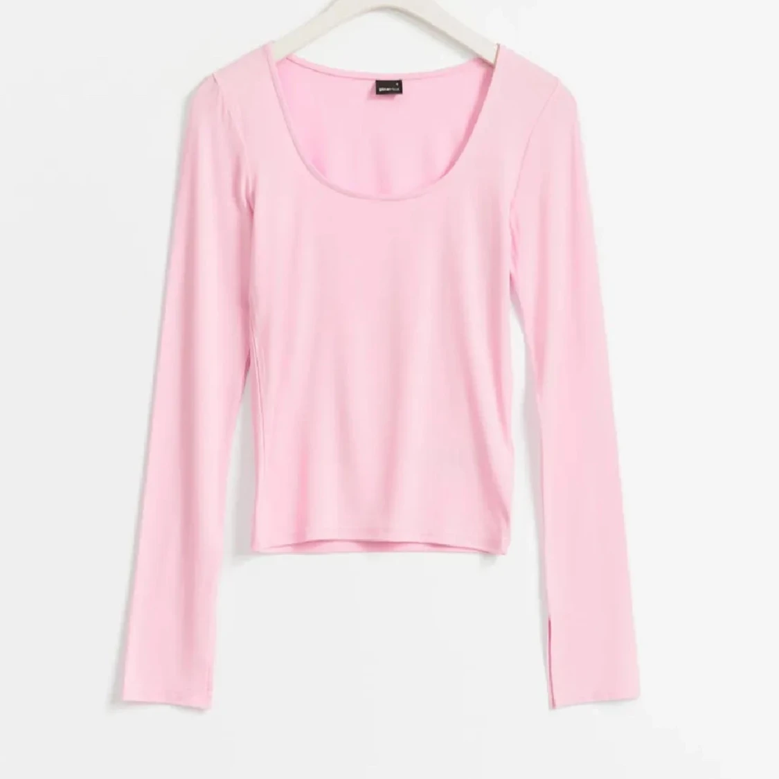 Rosa slits ärmad tröja