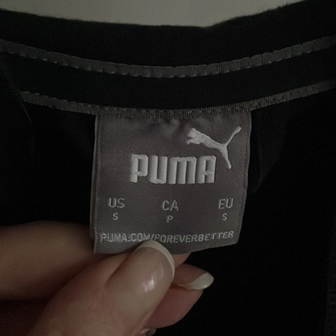 Svart huvtröja från Puma - 91