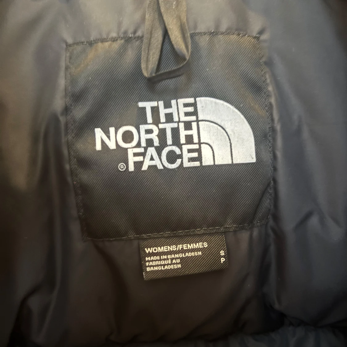 Svart dunjacka från The North Face - 91