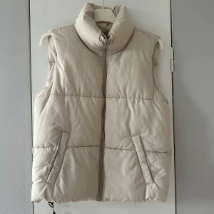 Beige väst - Endast använd 1 gång