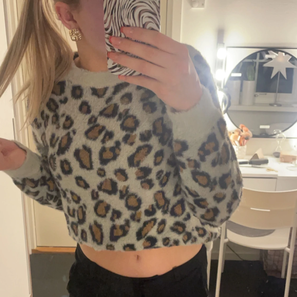 Leopardmönstrad tröja