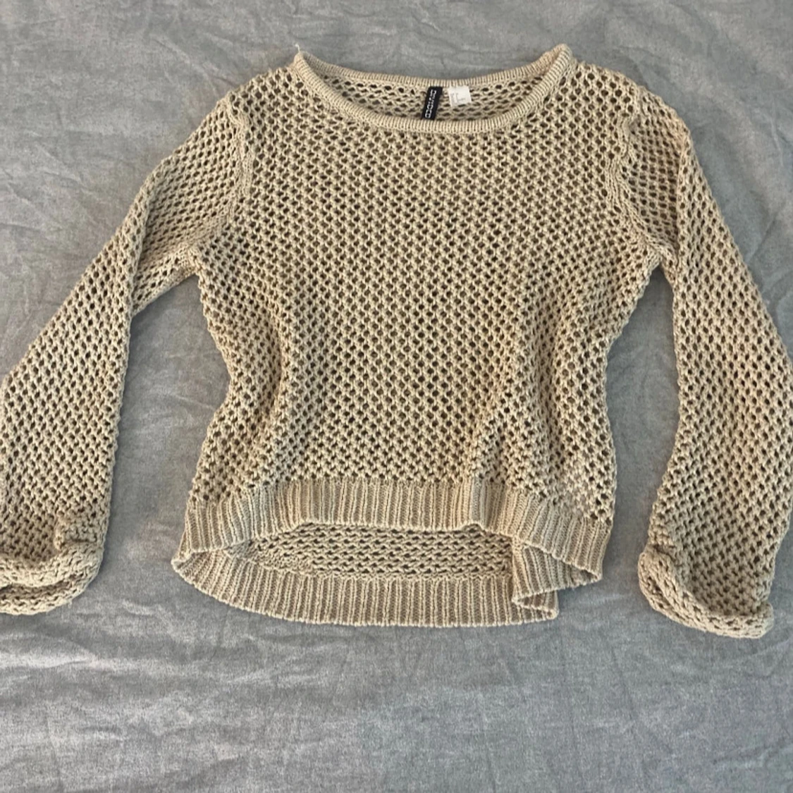 Beige stickad tröja från H&M