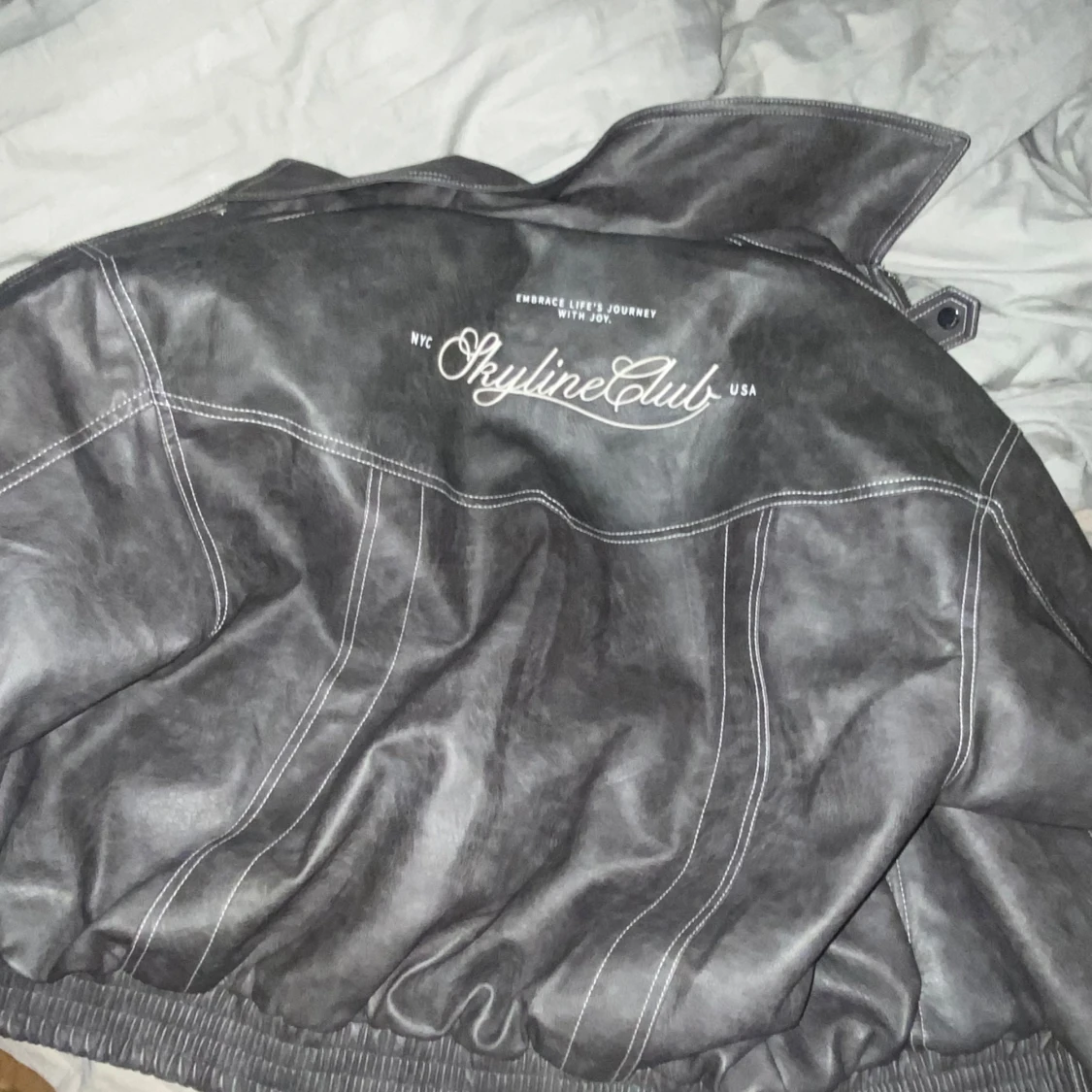 Grå skinnjacka från Skyline Club