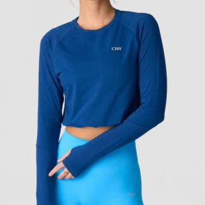 Iciw topp - Långärmad topp från ICIW. Den har även tumhål och reglerbart resår nertill. Använd 1 gång. Nypris 449kr.