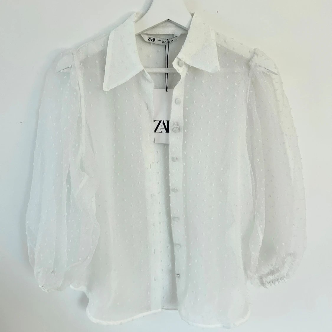 Vit genomskinlig blus, helt ny - 2