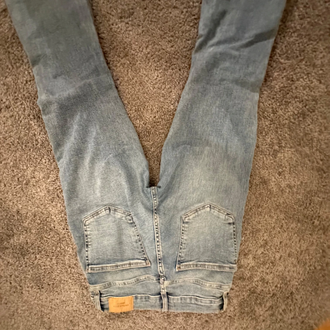 Ljusblå jeansbyxor - 1