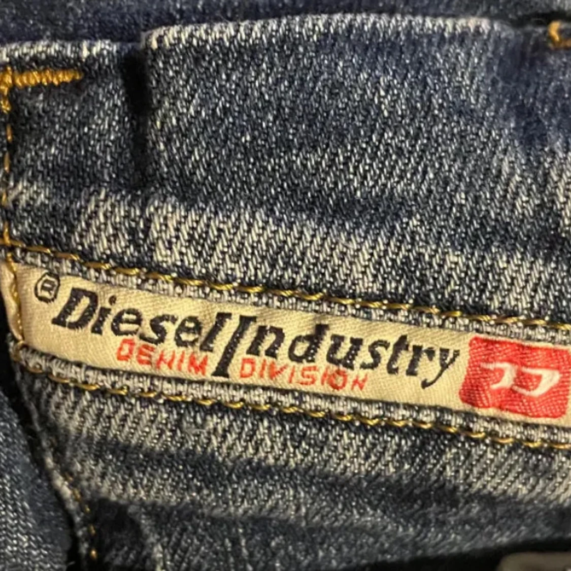 Blå lågmidjade bootcut jeans från Diesel - 4